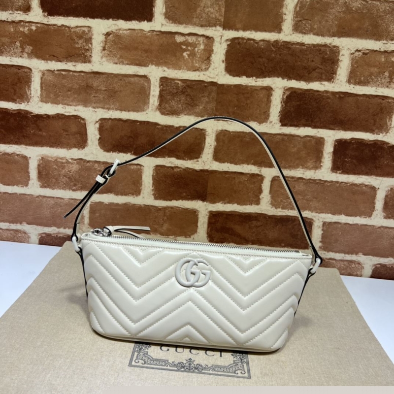 G*u*i top handle bags